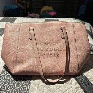 Light pink Kate Spade purse hardly used a handful of times.